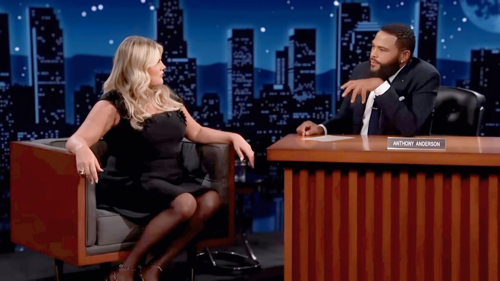 Heather McMahan and Anthony Anderson in conversation on Jimmy Kimmel Live during a segment about her neck job and cruise story.