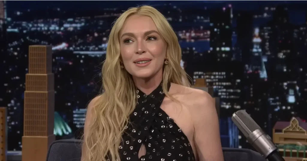 Lindsay Lohan before and after evolution, confidently smiling during The Tonight Show Starring Jimmy Fallon appearance.